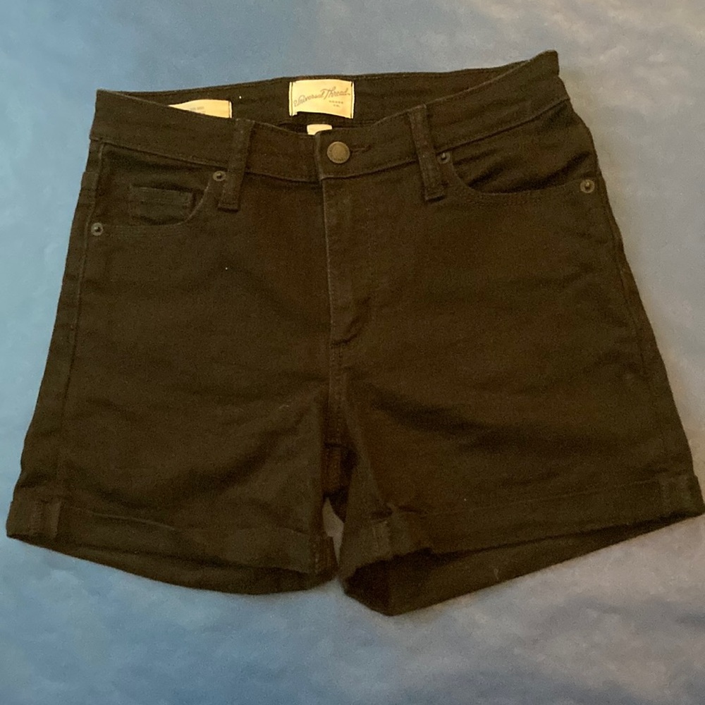 • Black shorts •